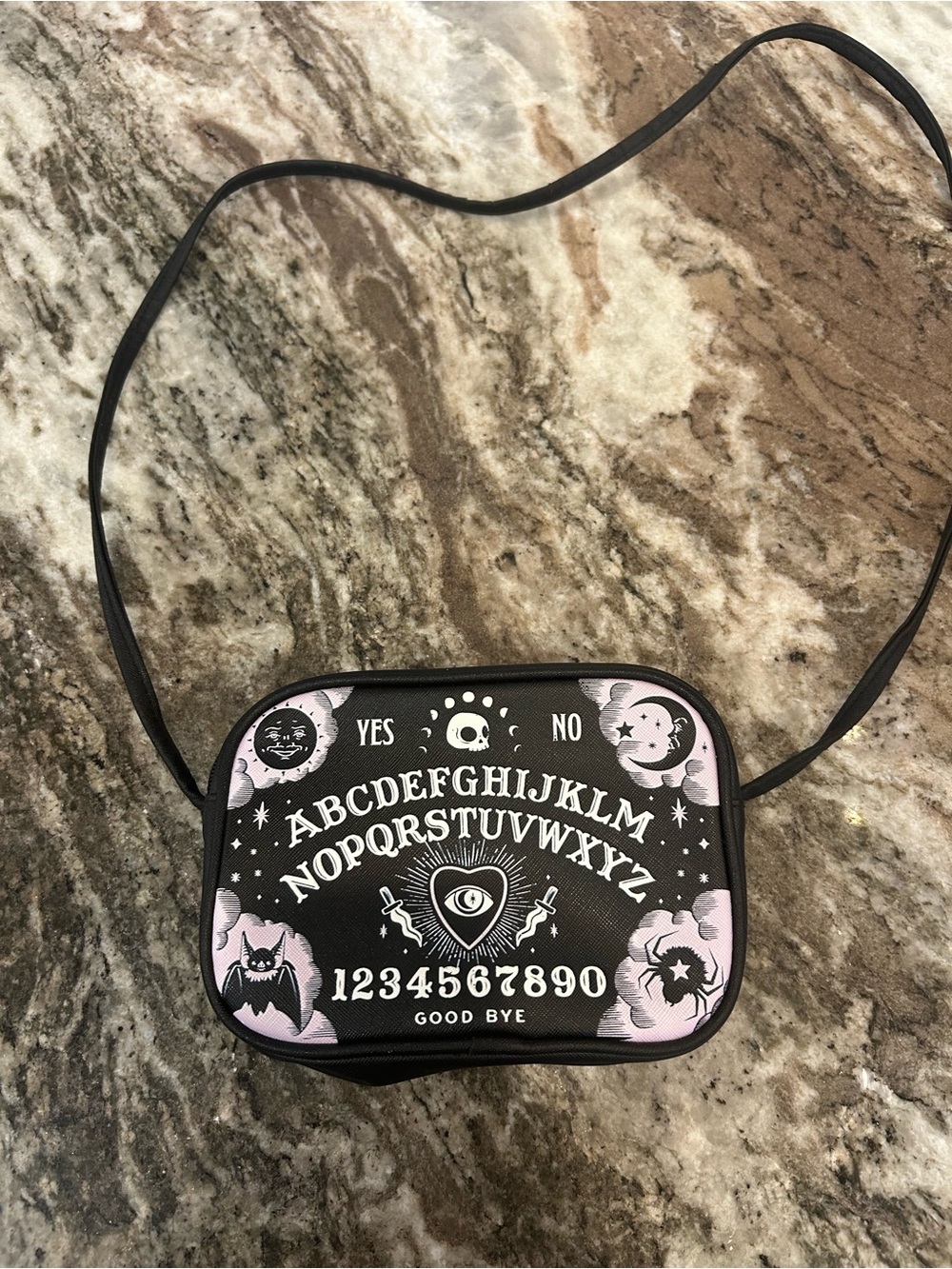 Hot Topic Black and Light Pink Ouija Crossbody Bag has stain strap wear